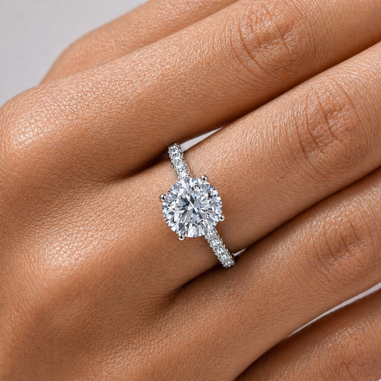 Round Cut Moissanite Ring with Pavé Band